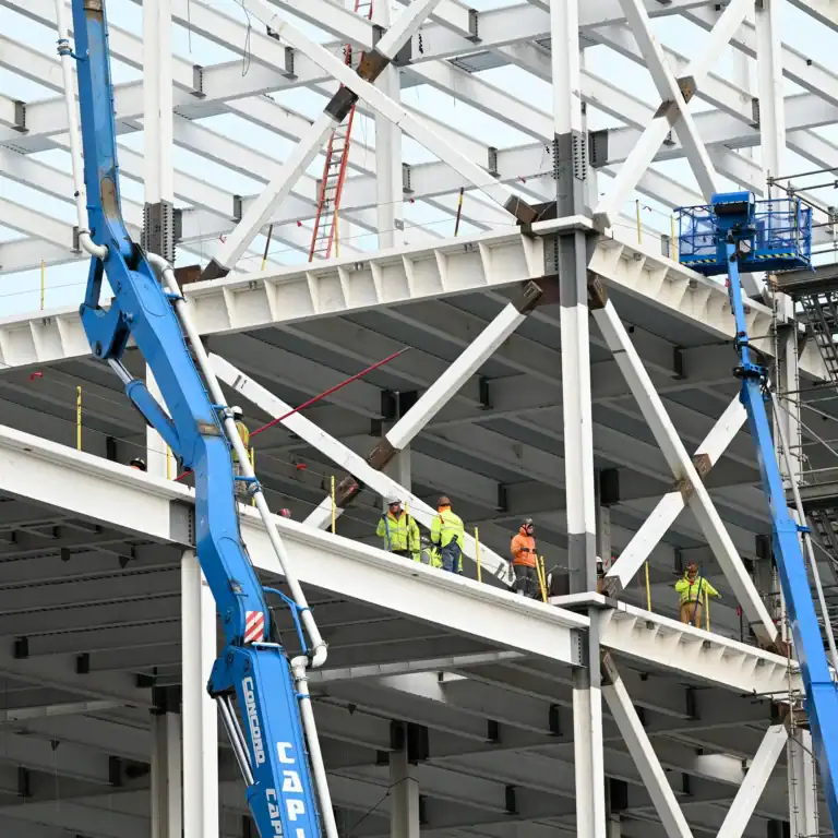 Construction workers at BAM-2 factory